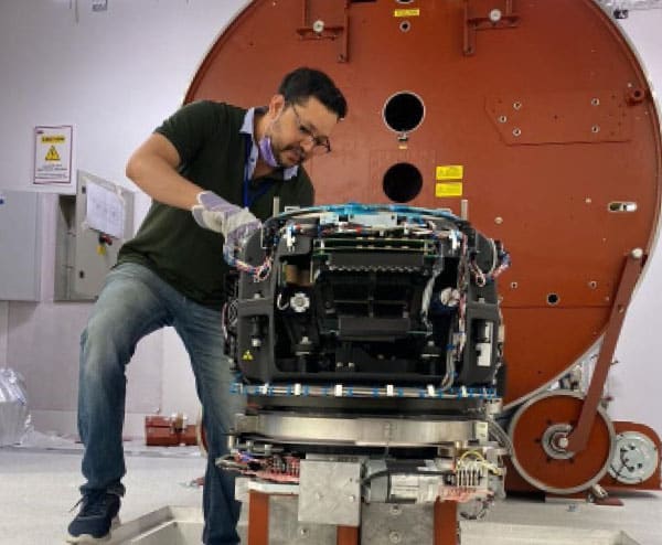 Photo by Hamidsha Shahudeen: Eng. Shibu Shanker deeply engrossed in the installation of an Elekta Radiotherapy (LINAC) equipment.
